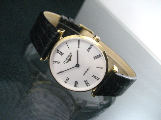 LA GRANDE CLASSIQUE DE LONGINES GOLD SILVER DIAL ROMAN NUMERALS