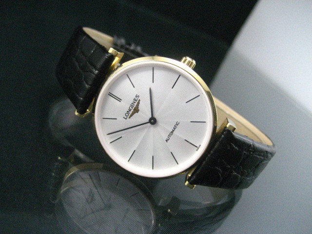 LA GRANDE CLASSIQUE DE LONGINES GOLD SILVER DIAL STICK NUMERALS