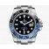 The New Version - The words "GMT-Master II" at 6:00 is  WHITE (Same as Rolex Official Site). 